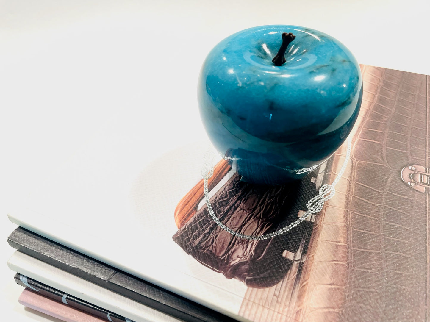 A Blue Marble Apple With Stem