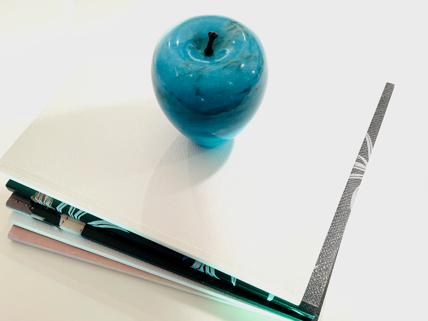 A Blue Marble Apple With Stem