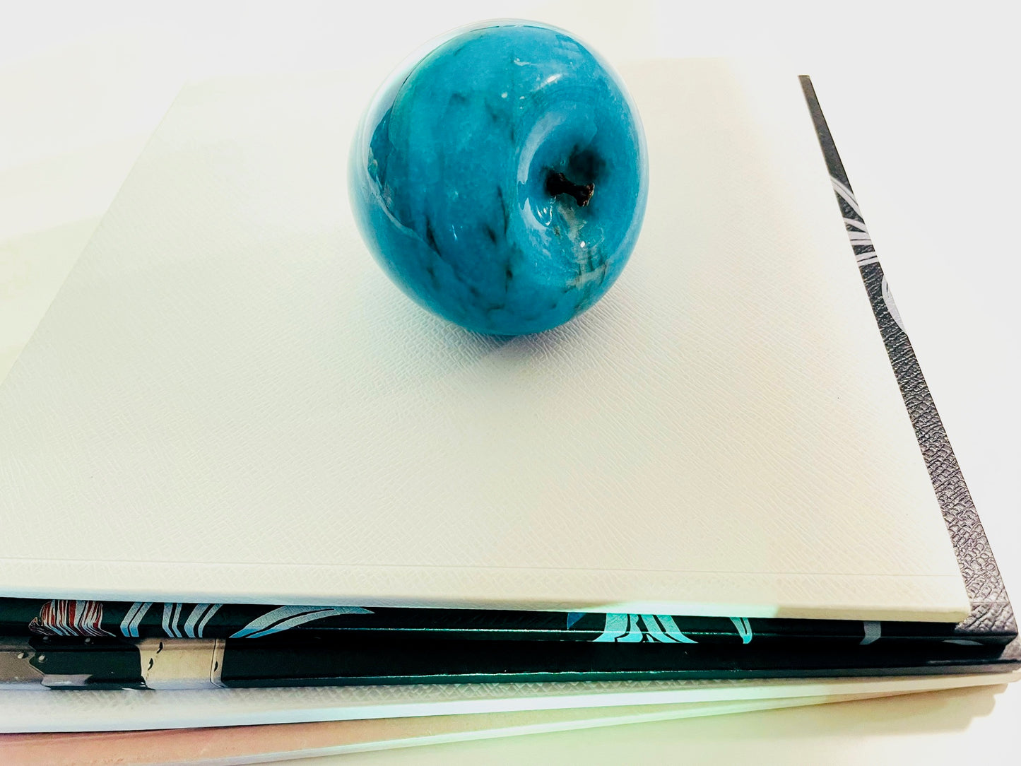 A Blue Marble Apple With Stem