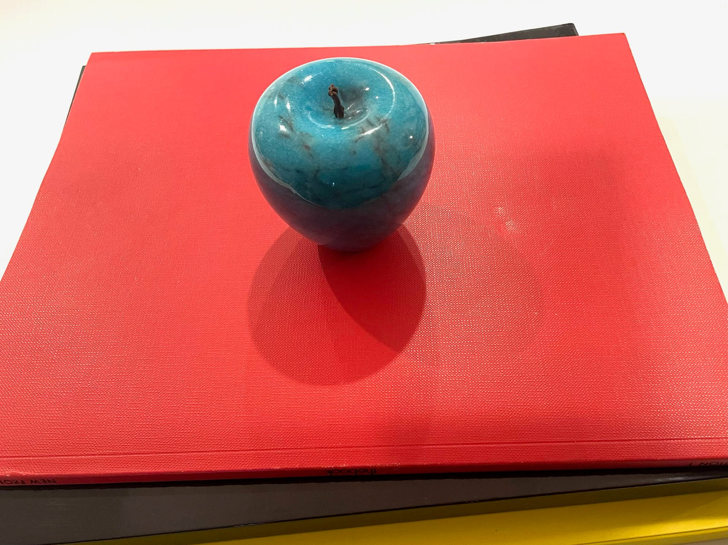 A Blue Marble Apple With Stem