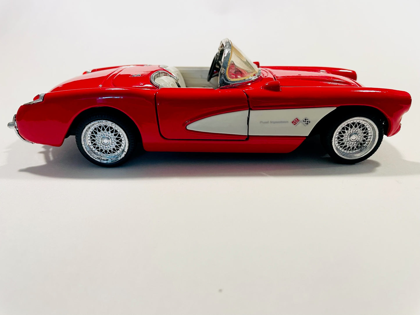 1957 Red Convertible Chevrolet Corvette Dicast Model Car White Interior