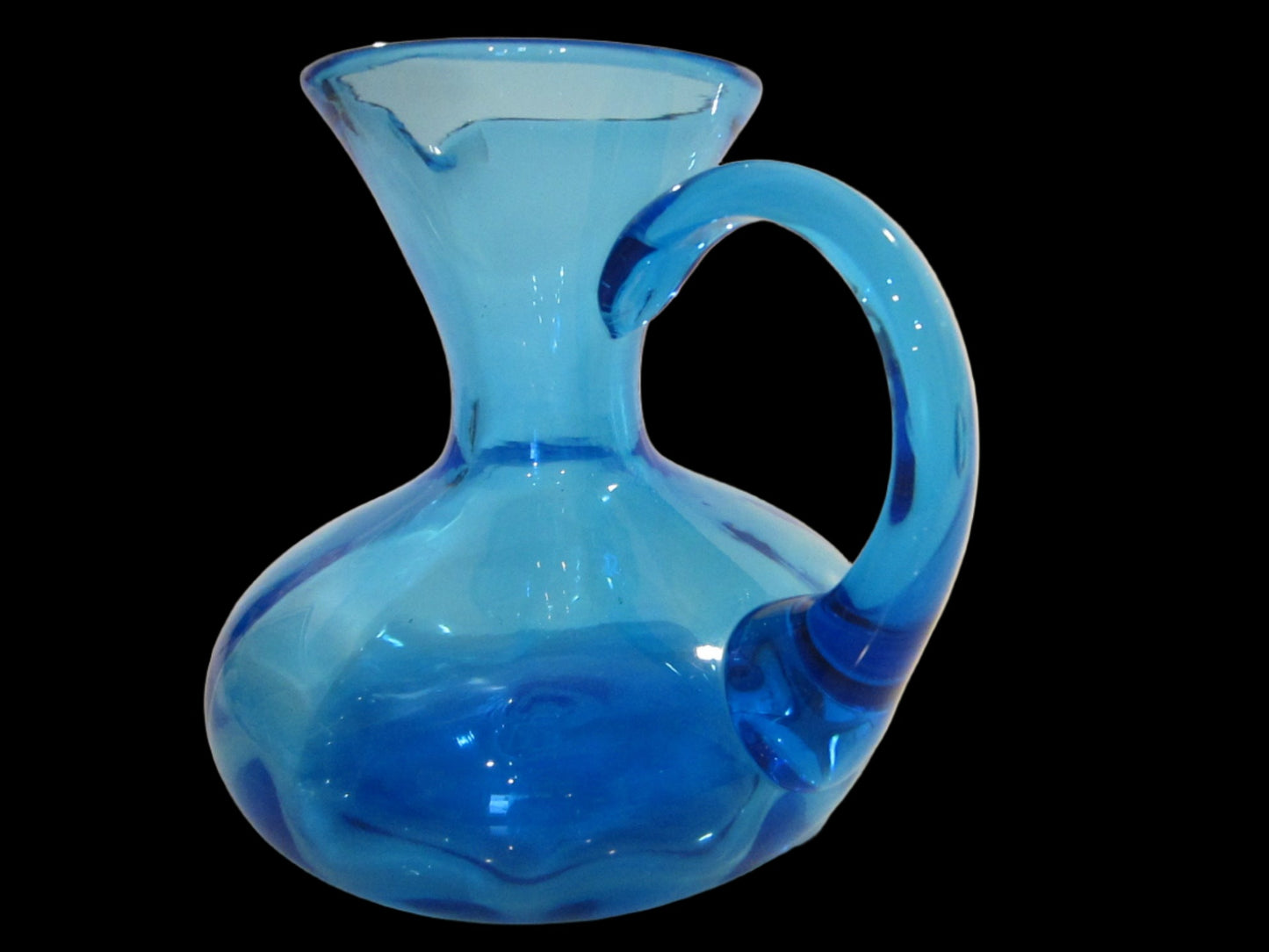 A Mid Century Powder Blue Blown Glass Cruet Jug Round Handle