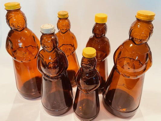 Aunt Jemima Various Sizes Six Brown Glass Bottles Caps Relief Marked