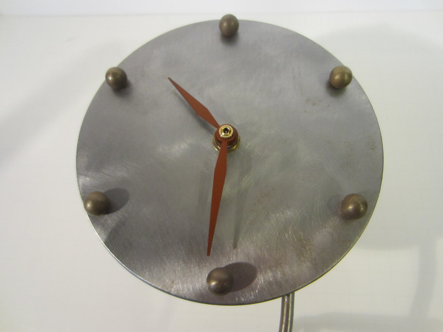 A Modern Pedestal Abstract Juxtaposition Round Dial Quartz Clock