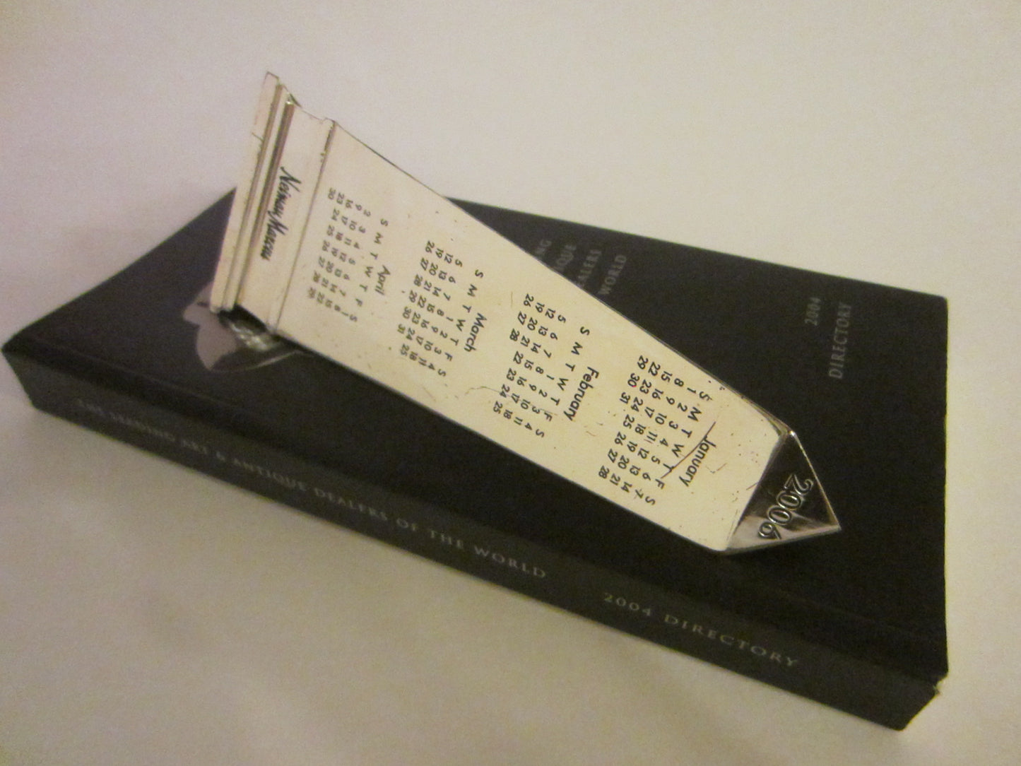 Obelisk Nickel Paperweight 2006 Calendar Neiman Marcus Exclusive - Designer Unique Finds 