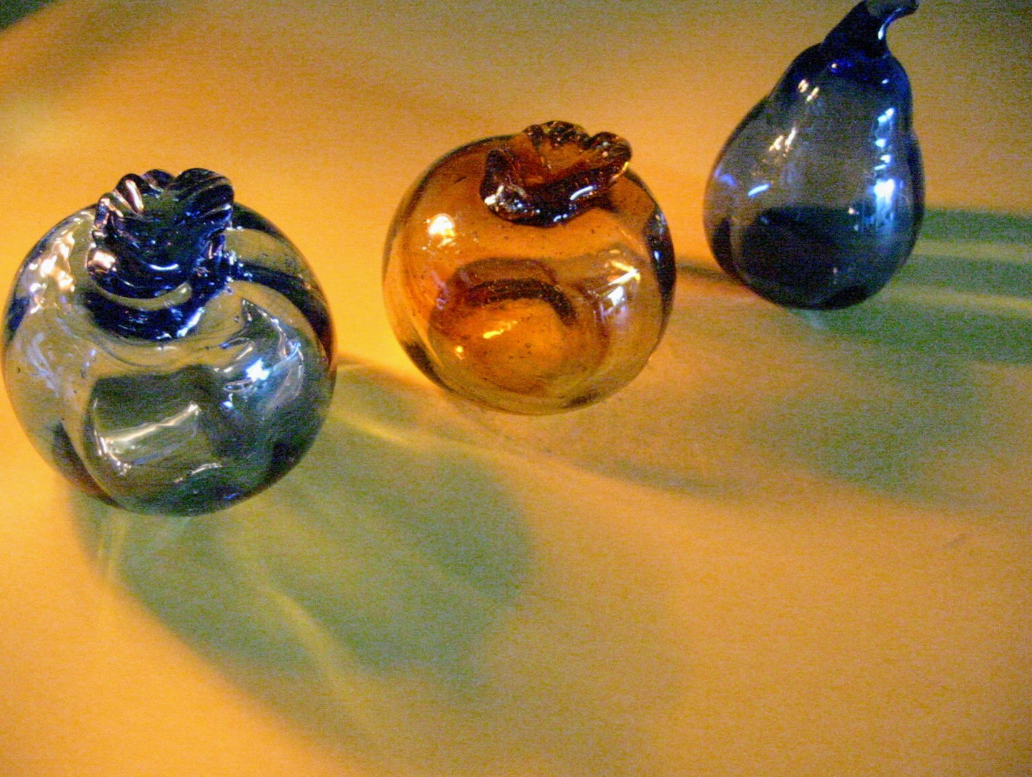 Three Modernist Hand Blown Colored Glass Fruits