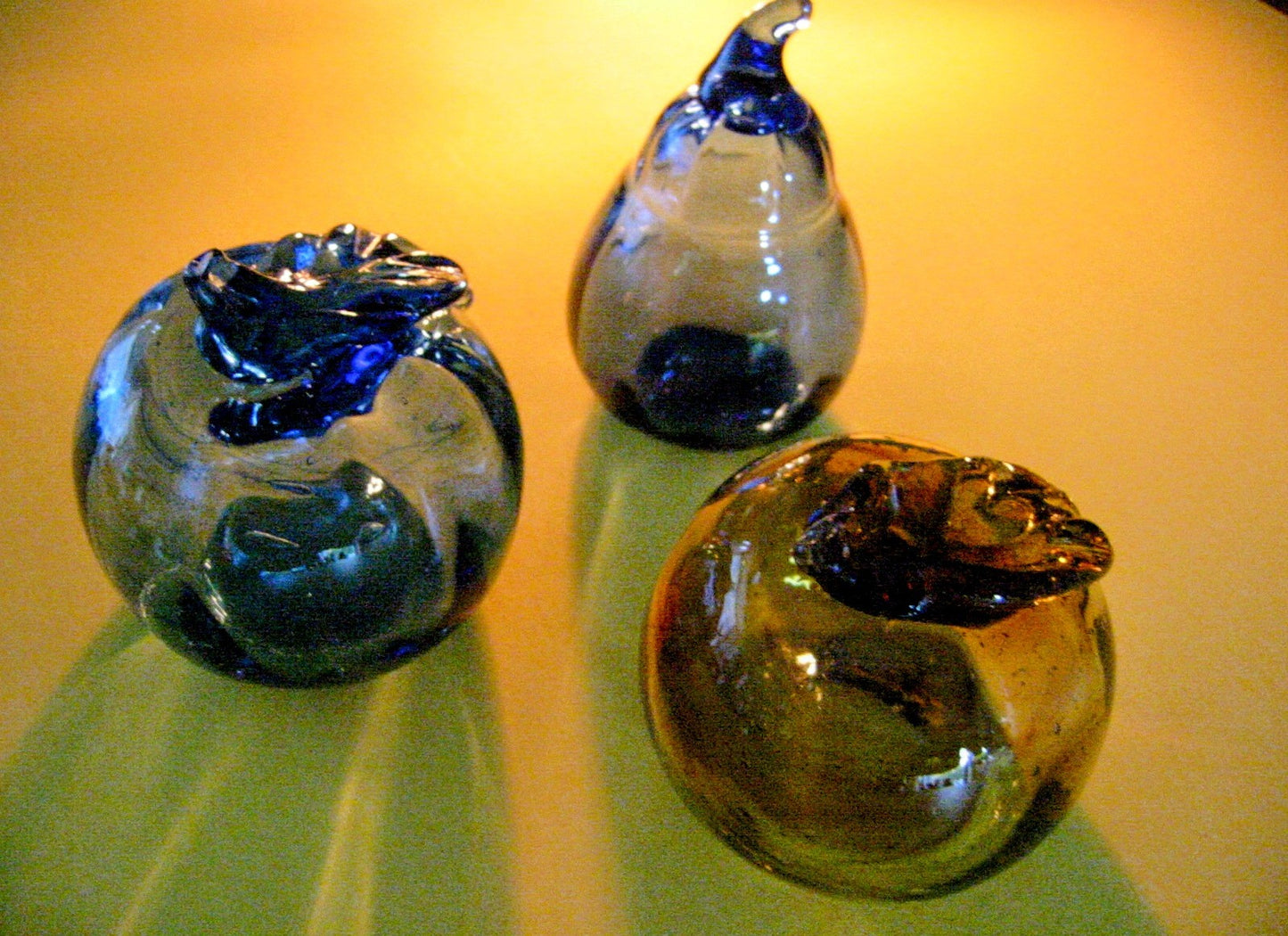 Three Modernist Hand Blown Colored Glass Fruits