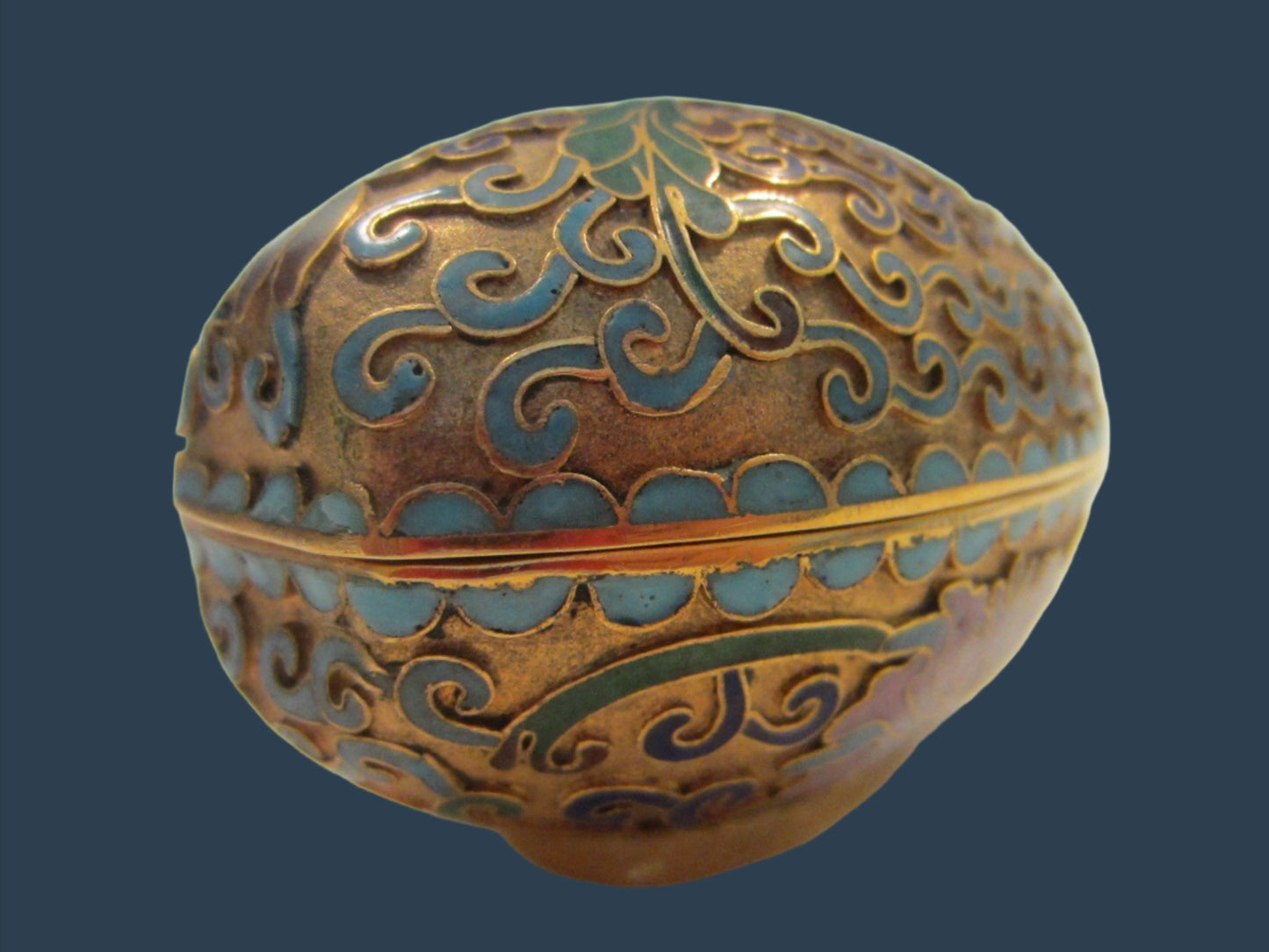 A Cloisonne Covered Pink Lotus Enameled Golden Egg Candleholder