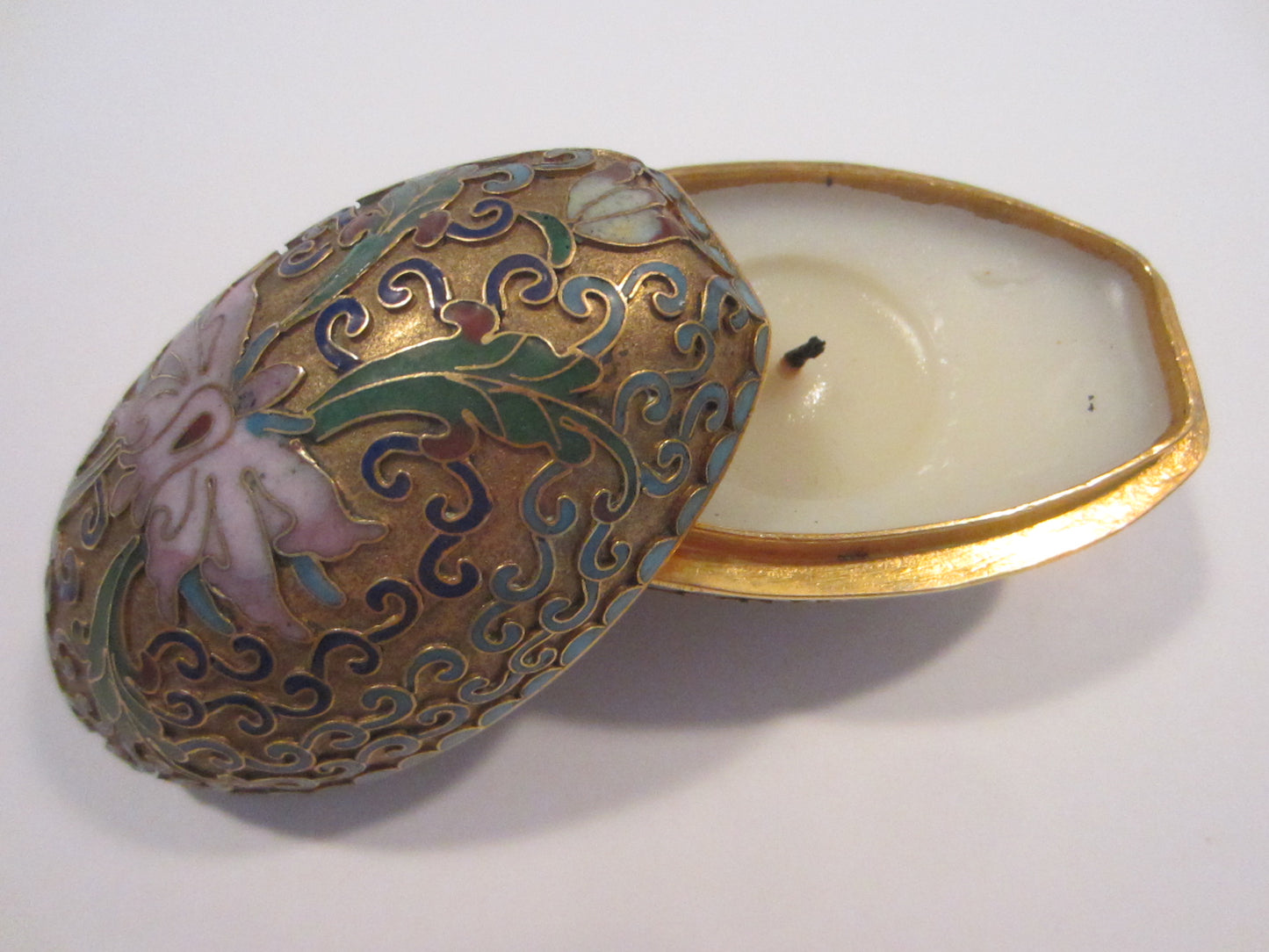 A Cloisonne Covered Pink Lotus Enameled Golden Egg Candleholder