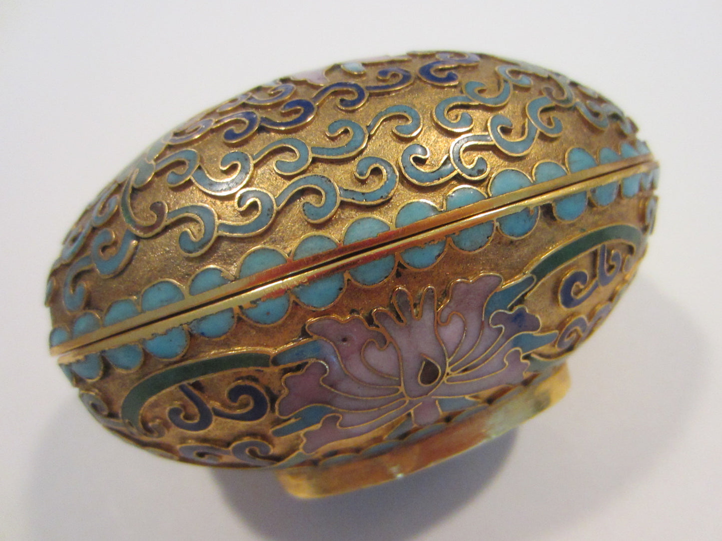 A Cloisonne Covered Pink Lotus Enameled Golden Egg Candleholder