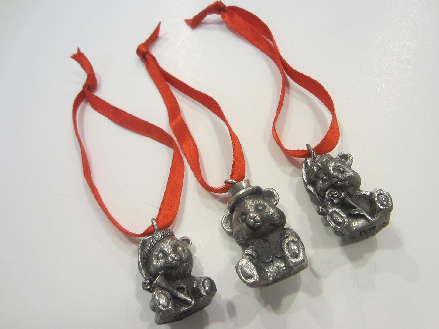 Three Miniature Pewter Teddy Bears Ornaments